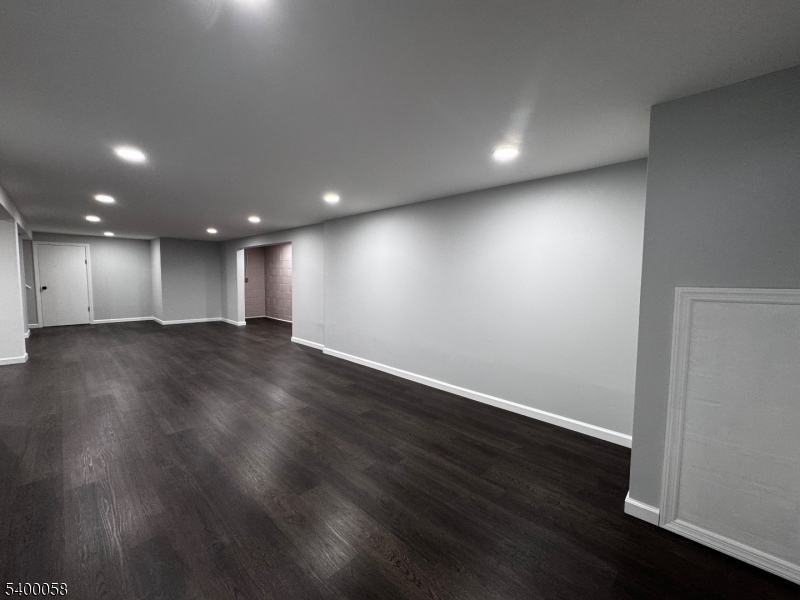 3 Fulper Place Clinton, NJ 08809 - Photo 34 of 49 a view of an empty room with wooden floor