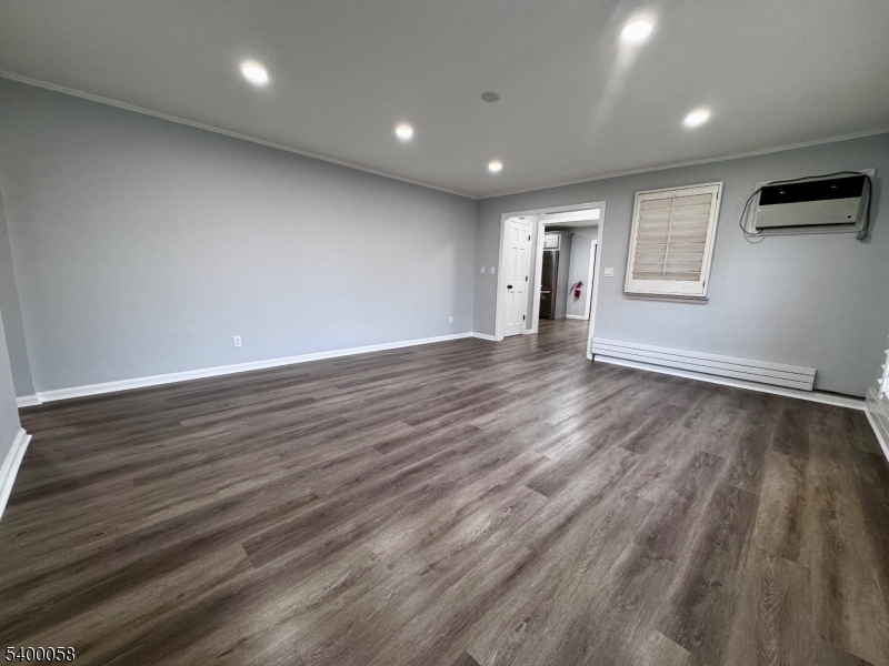 3 Fulper Place Clinton, NJ 08809 - Photo 35 of 49 an empty room with wooden floor and windows