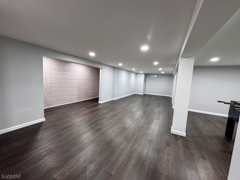 3 Fulper Place Clinton, NJ 08809 - Photo 36 of 49 a view of empty room with wooden floor