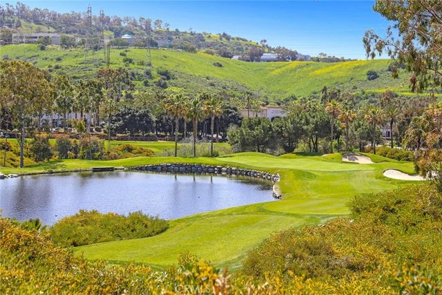 a view of a swimming pool with an ocean view