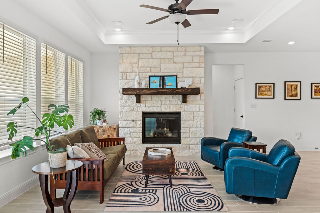 279 Fish Trap Road Dripping Springs, TX 78620 - Photo 11 of 36 Imagine visiting with family and friends in this cozy space, or hosting movie night.