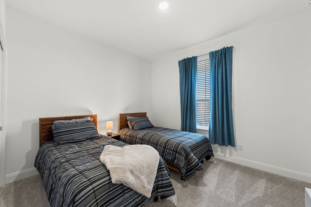 279 Fish Trap Road Dripping Springs, TX 78620 - Photo 20 of 36 Secondary bedroom near the front of the house.