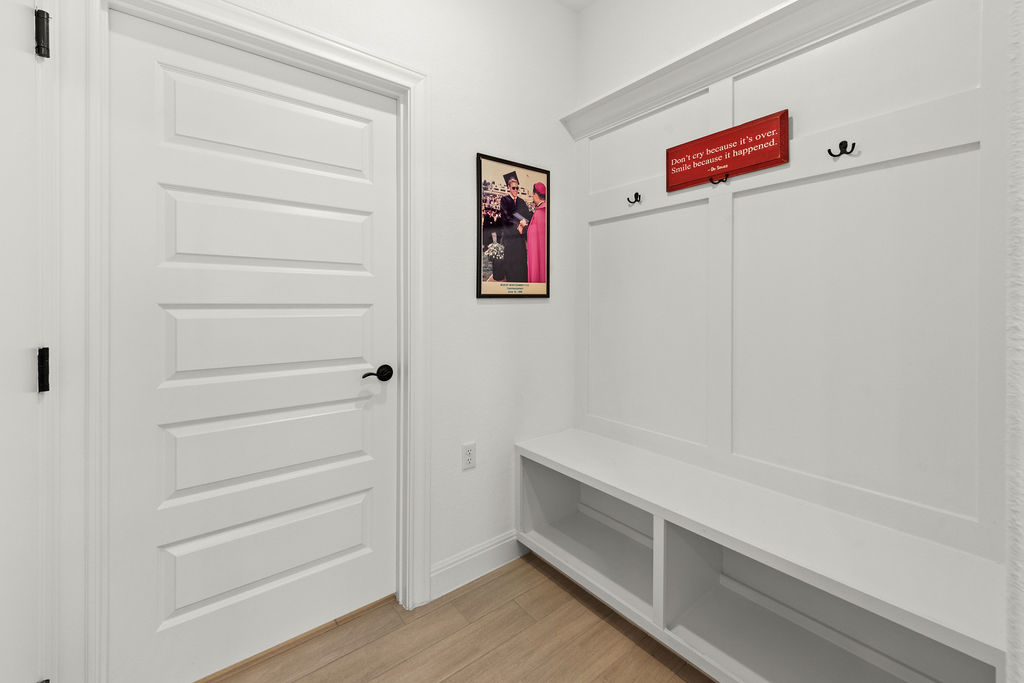 279 Fish Trap Road Dripping Springs, TX 78620 - Photo 24 of 36 Mudroom off garage entry with additional storage