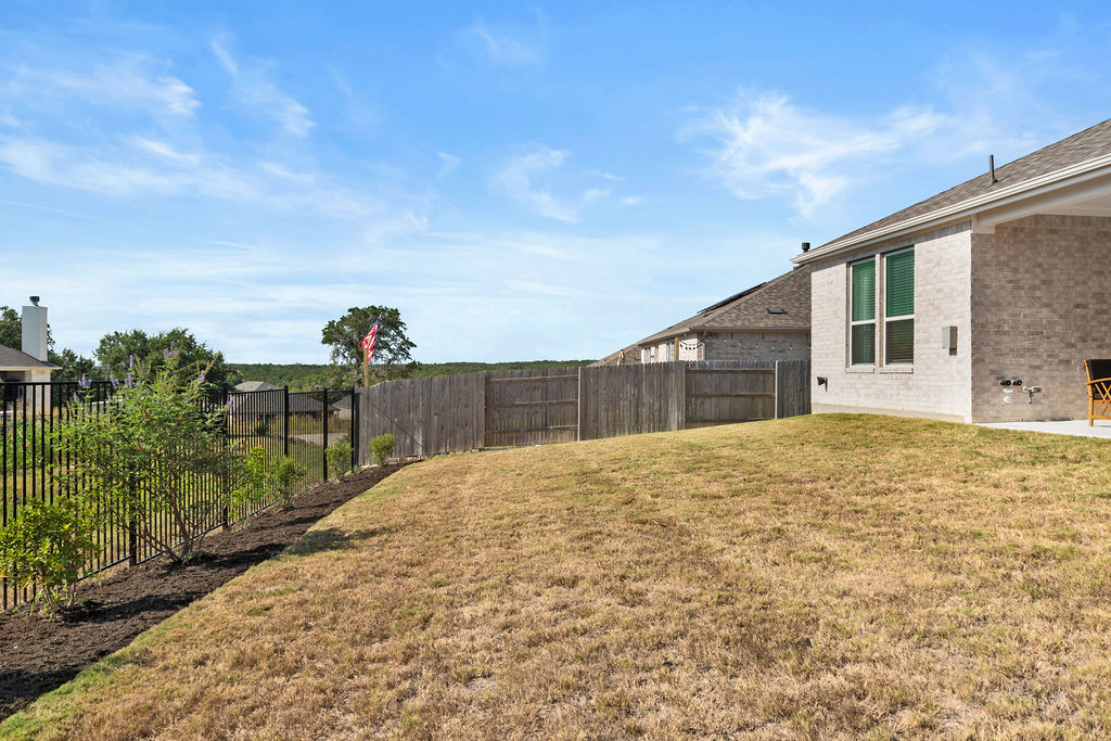 279 Fish Trap Road Dripping Springs, TX 78620 - Photo 29 of 36 Backyard gets a long view of the hill country to the right