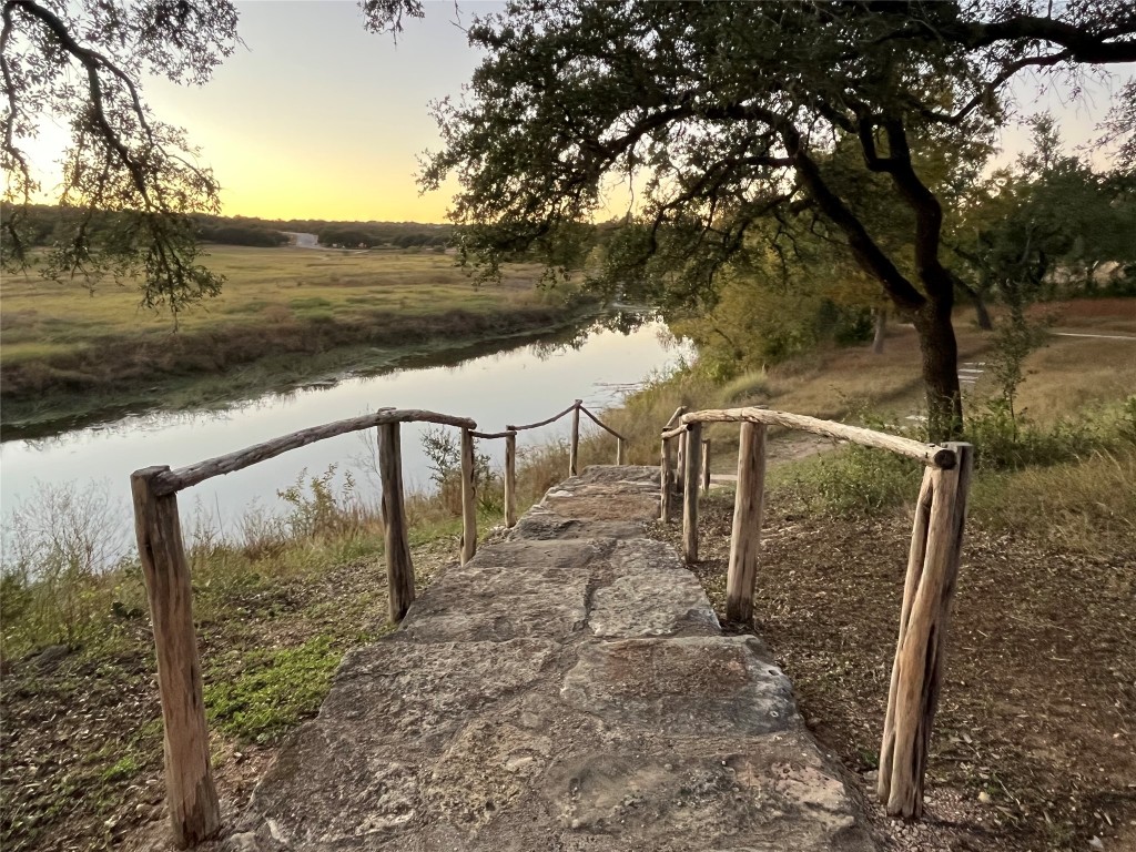 279 Fish Trap Road Dripping Springs, TX 78620 - Photo 2 of 36 The community enjoys miles of trails, some that run alongside Onion Creek.