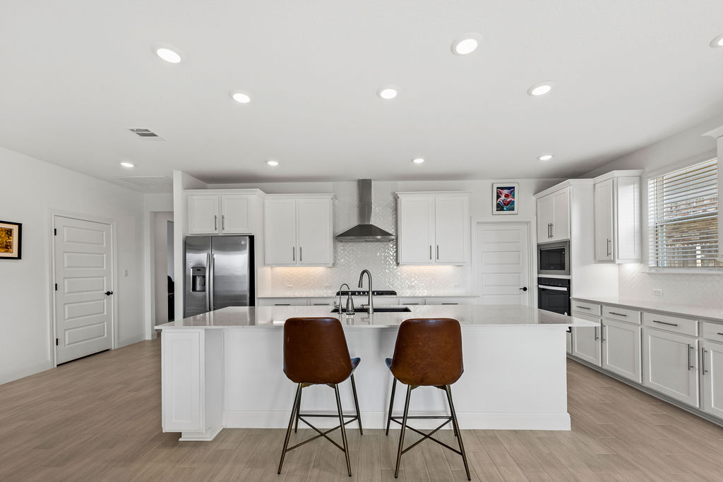 279 Fish Trap Road Dripping Springs, TX 78620 - Photo 7 of 36 The main center of this home is the huge gourmet kitchen!