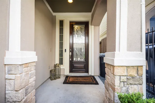 a view of entryway with wooden floor