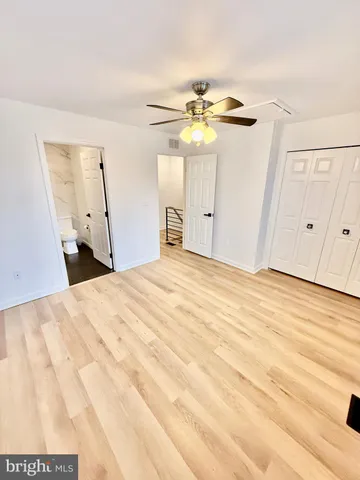 a view of a room with a fireplace