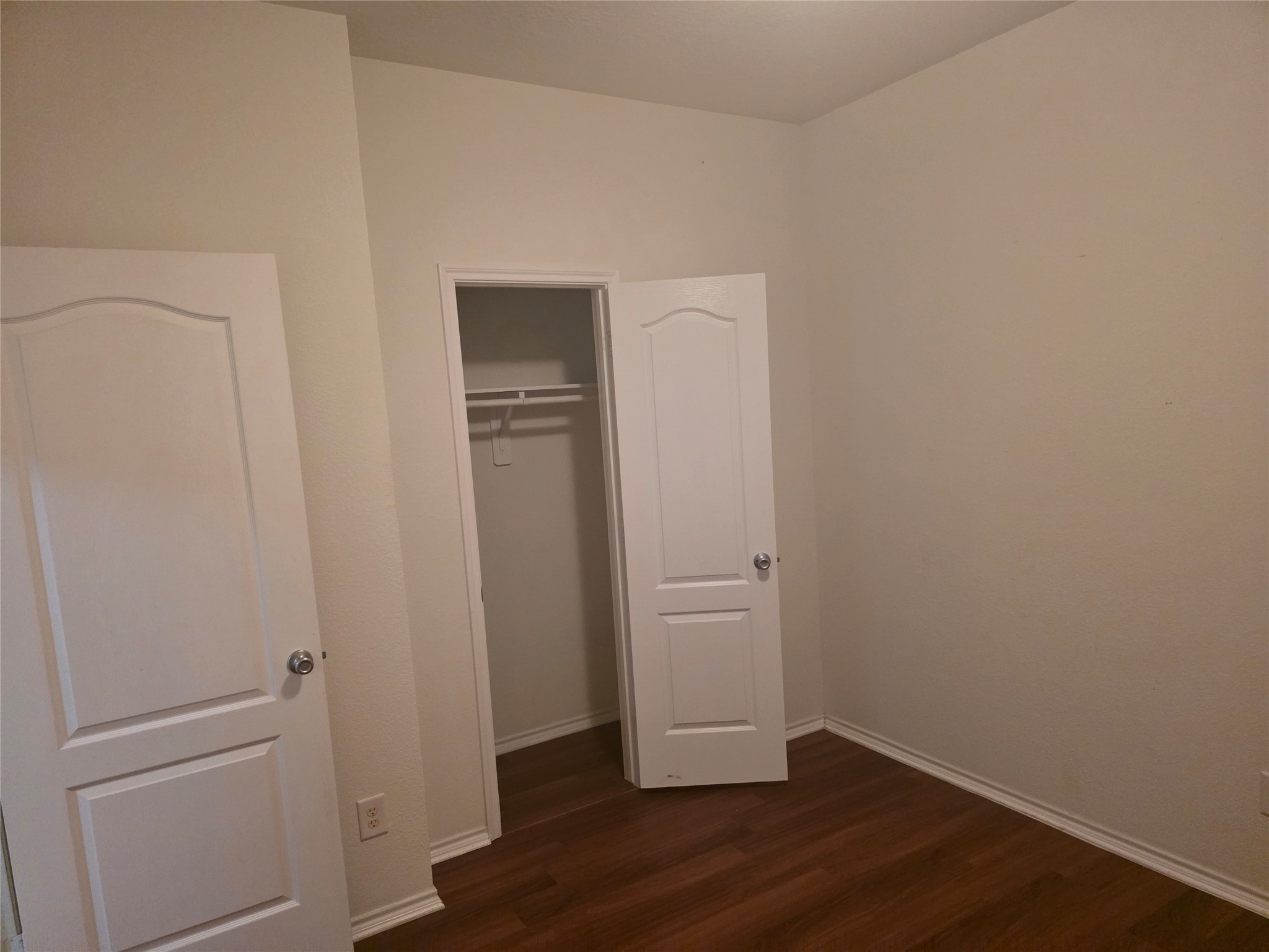 12062 Bach Orchard Trail Houston, TX 77038 - Photo 15 of 20 a view of an empty room with wooden floor