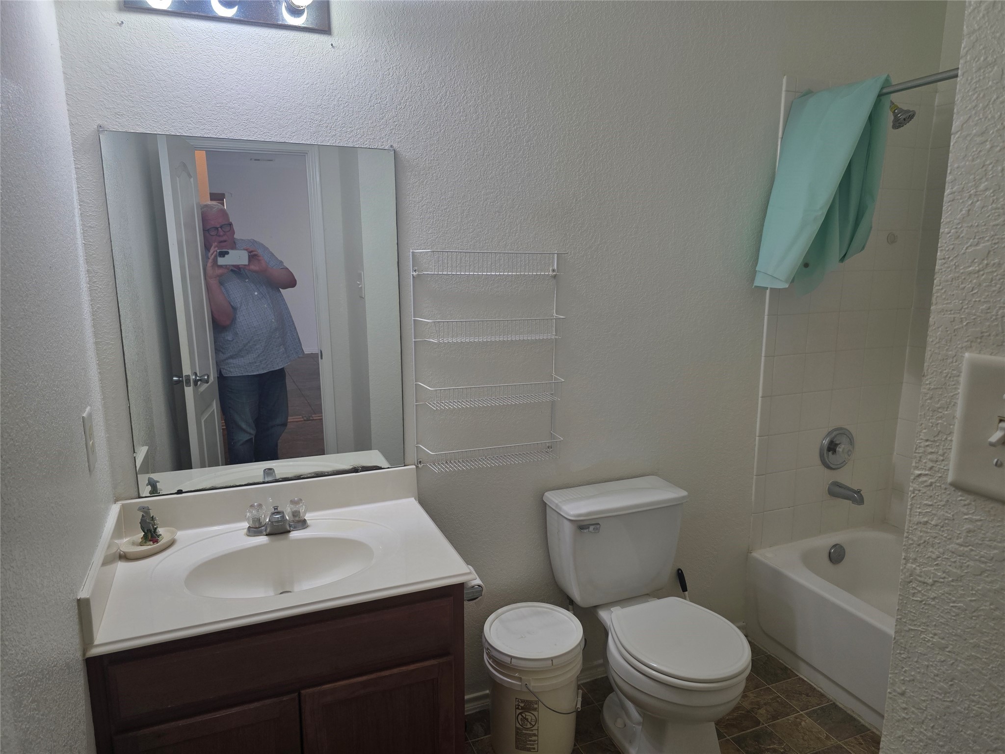 12062 Bach Orchard Trail Houston, TX 77038 - Photo 16 of 20 a bathroom with a sink toilet and shower