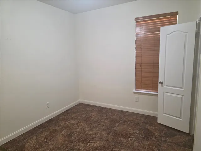 an empty room with closet