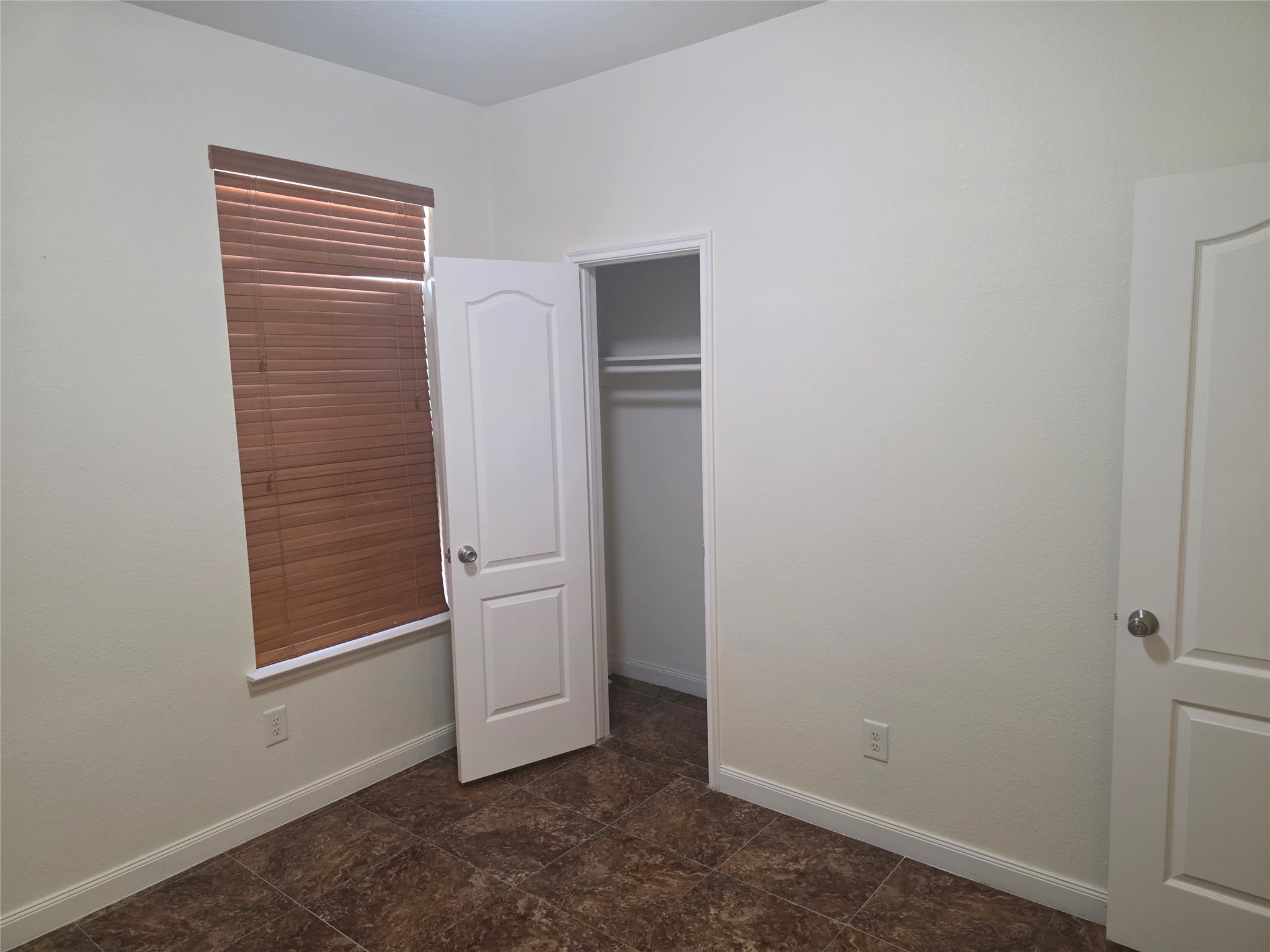 12062 Bach Orchard Trail Houston, TX 77038 - Photo 18 of 20 an empty room with closet