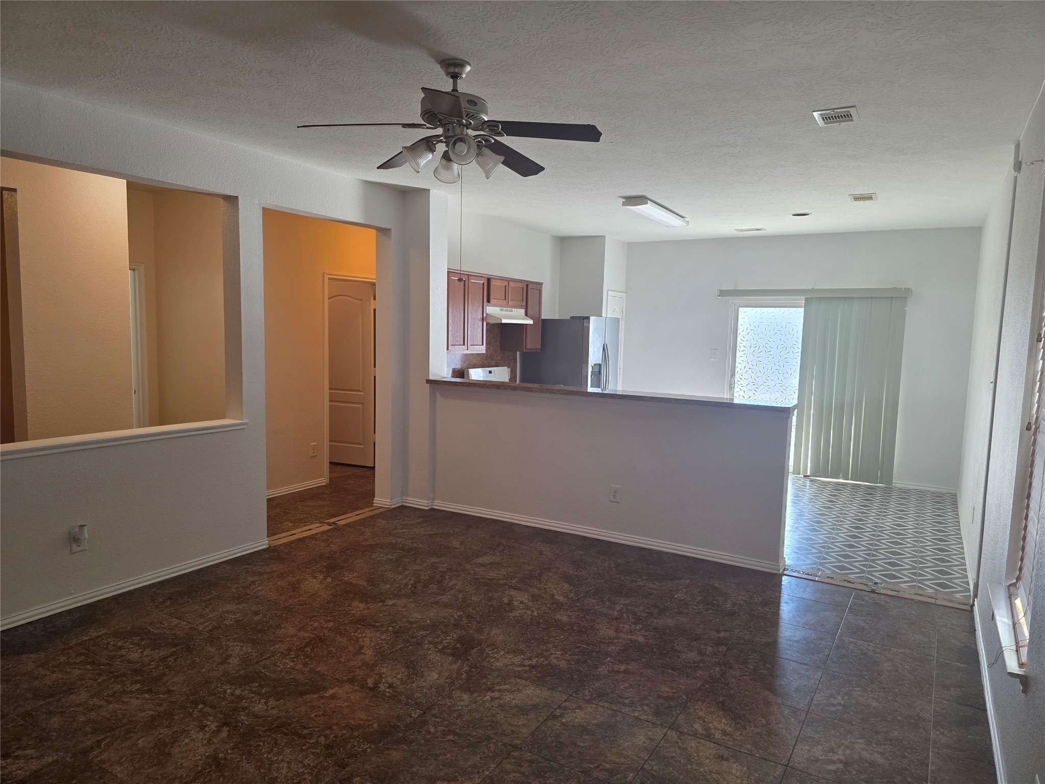12062 Bach Orchard Trail Houston, TX 77038 - Photo 2 of 20 a view of a kitchen with a sink and cabinet area