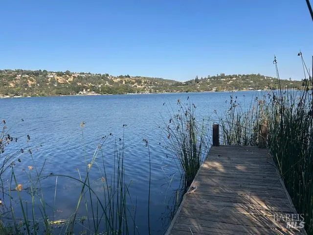 a view of a terrace with a lake view