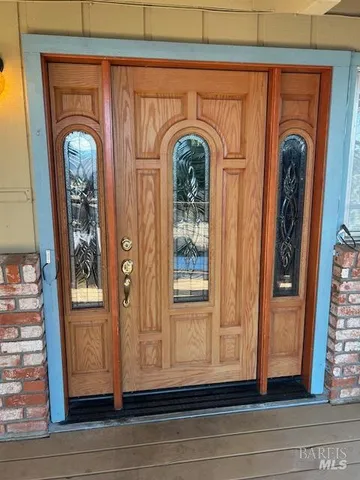 a stove top oven sitting inside of a kitchen