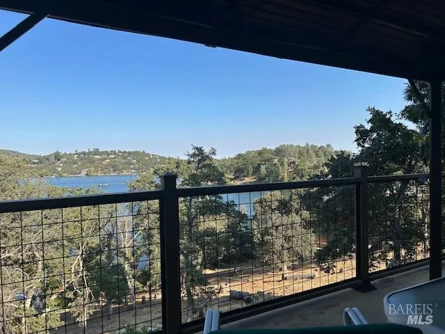 a view of a lake from a balcony