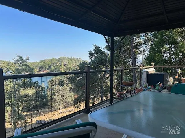 a view of a balcony with lake view