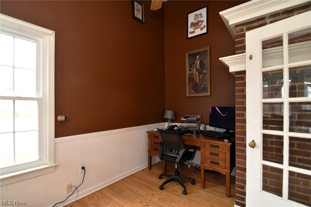 149 North Medina Line Road Akron, OH 44333 - Photo 10 of 36 Office area on the first floor has lots of natural light, hardwood floors, and exposed brick.