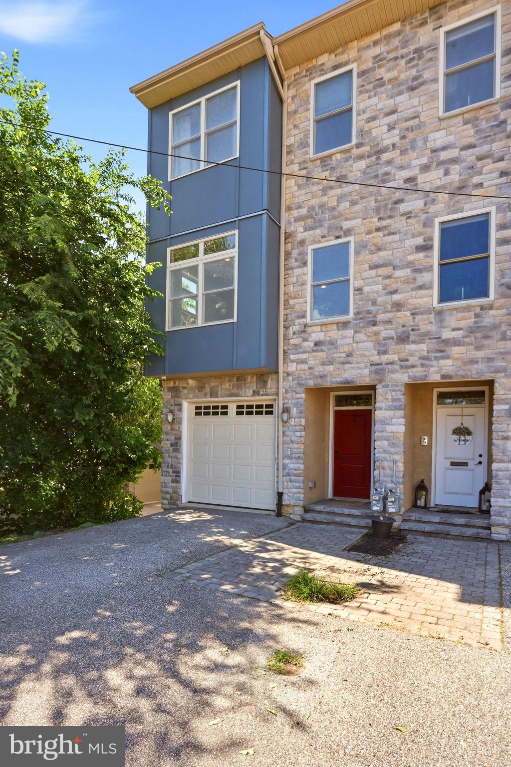 255 Ripka Street Philadelphia, PA 19127 - Photo 2 of 73 Modern townhouse with stone facade.