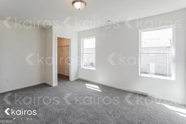 a view of an empty room and window