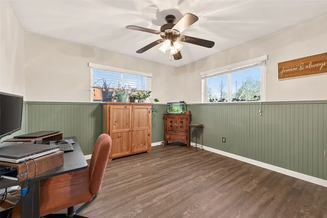 a view of workspace with wooden floor
