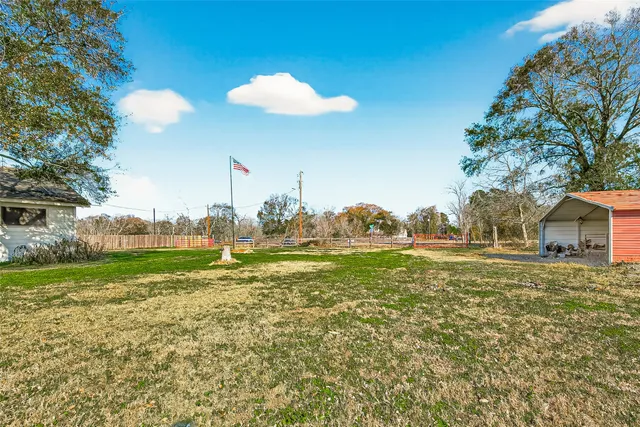 a view of a house with a big yard