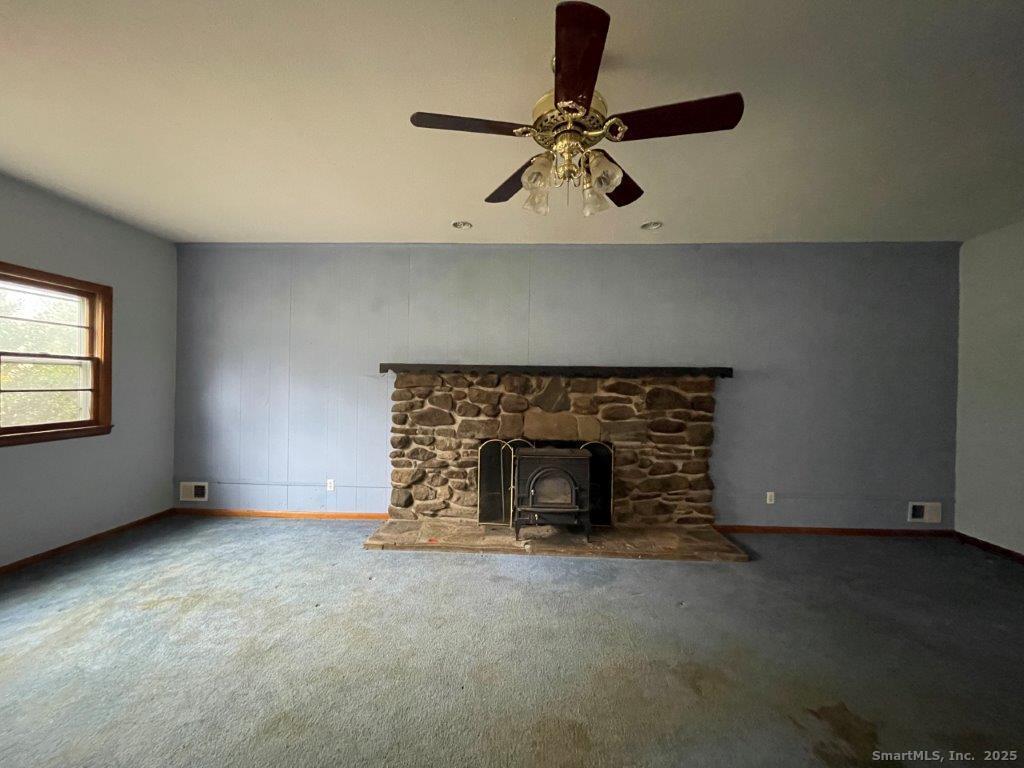 3 Medley Lane Clinton, CT 06413 - Photo 11 of 35 an empty room with a fireplace