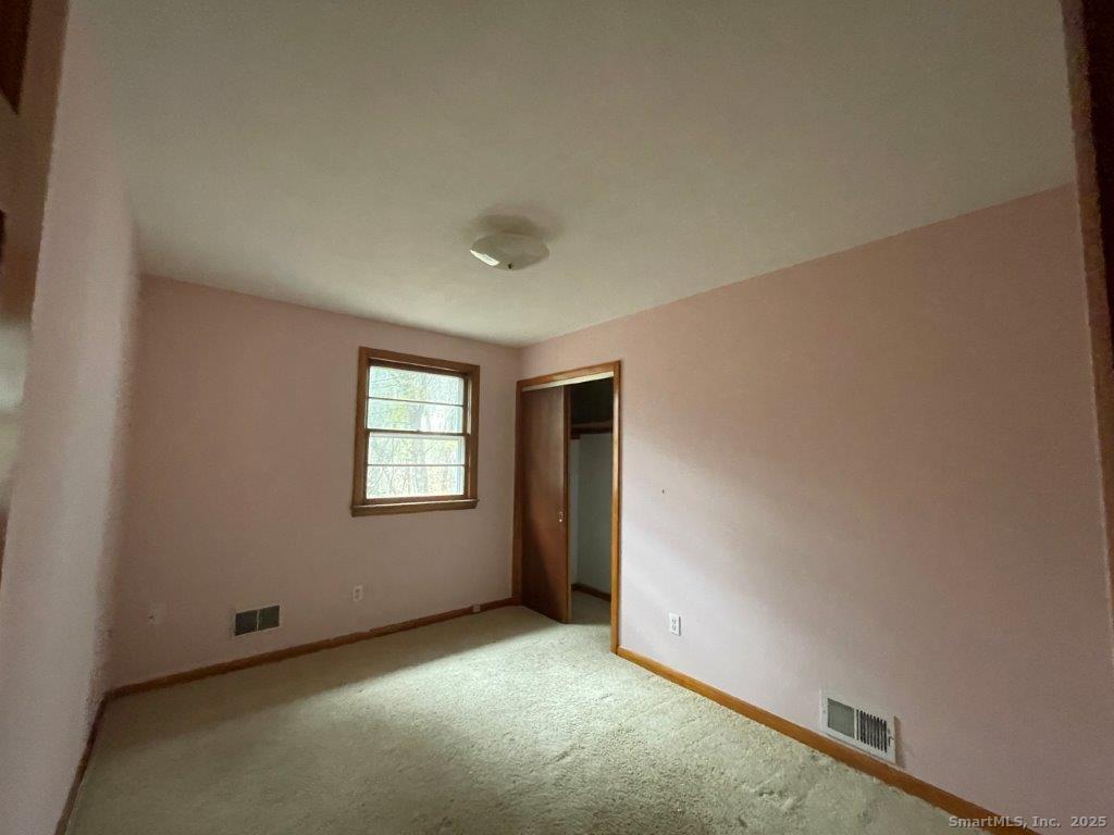 3 Medley Lane Clinton, CT 06413 - Photo 19 of 35 an empty room with windows