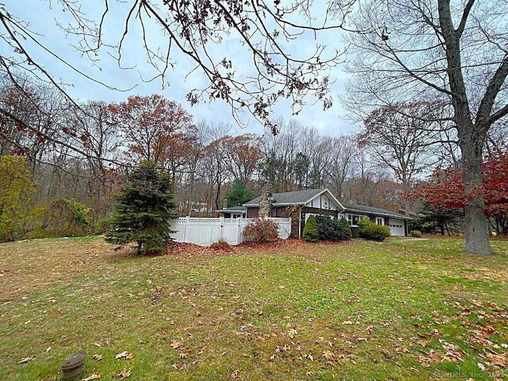 3 Medley Lane Clinton, CT 06413 - Photo 2 of 35 a view of a yard with some trees