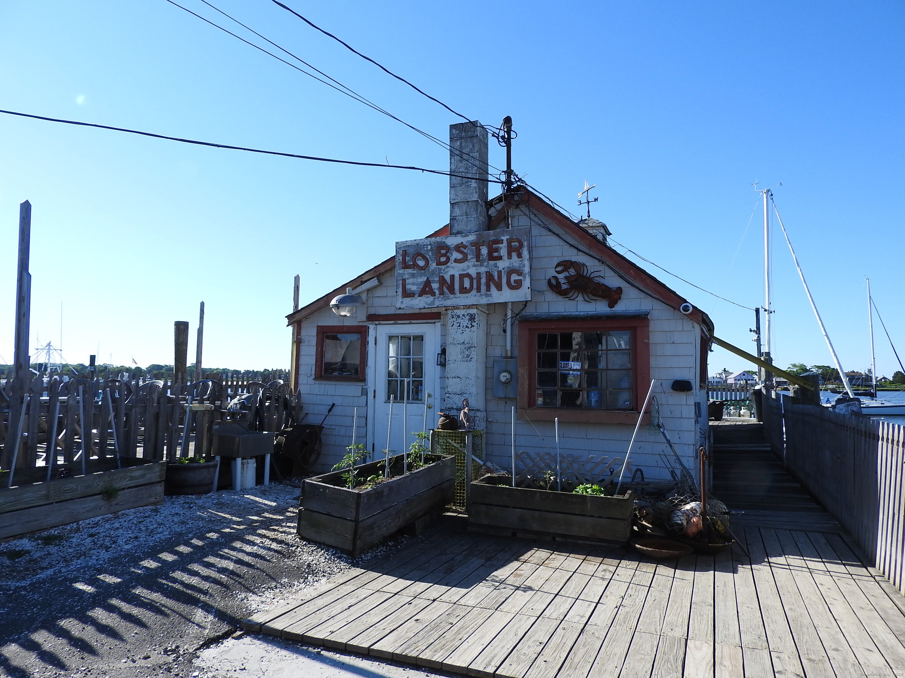 3 Medley Lane Clinton, CT 06413 - Photo 33 of 35 a view of a two chairs in the roof deck