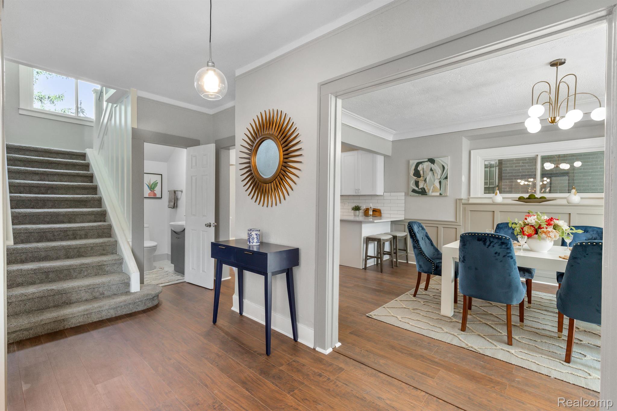 View of Dining Room and half bath from Living Room