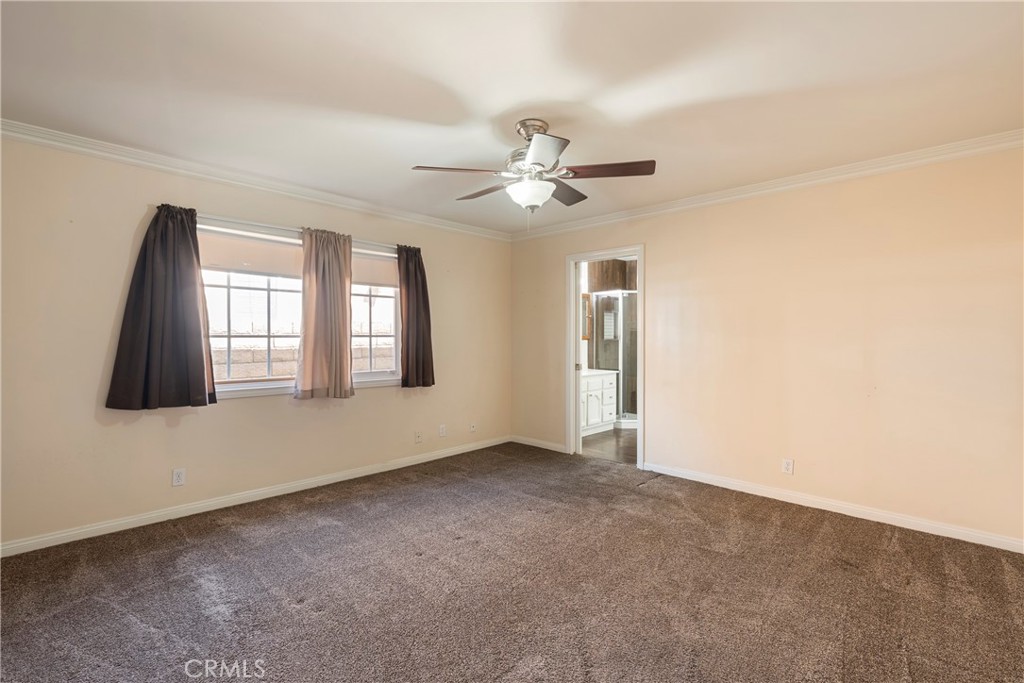 232 North Aspan Avenue Azusa, CA 91702 - Photo 11 of 29 a view of an empty room with a window