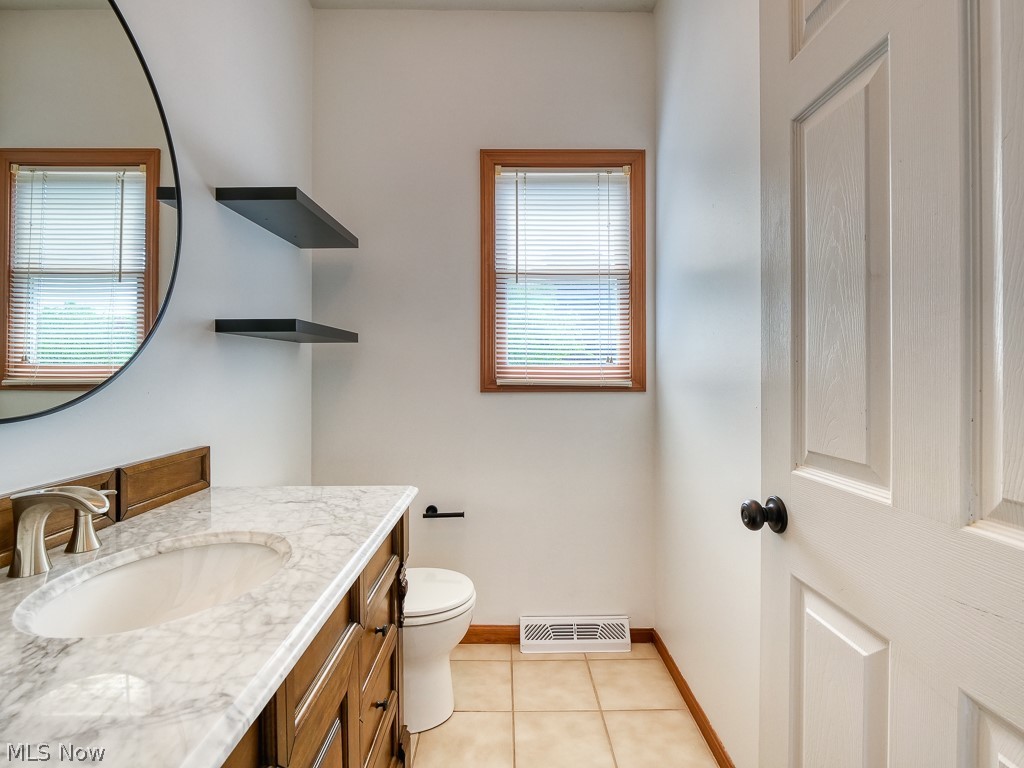 5005 Shady Ridge Lane Independence, OH 44131 - Photo 21 of 34 1st floor half bath