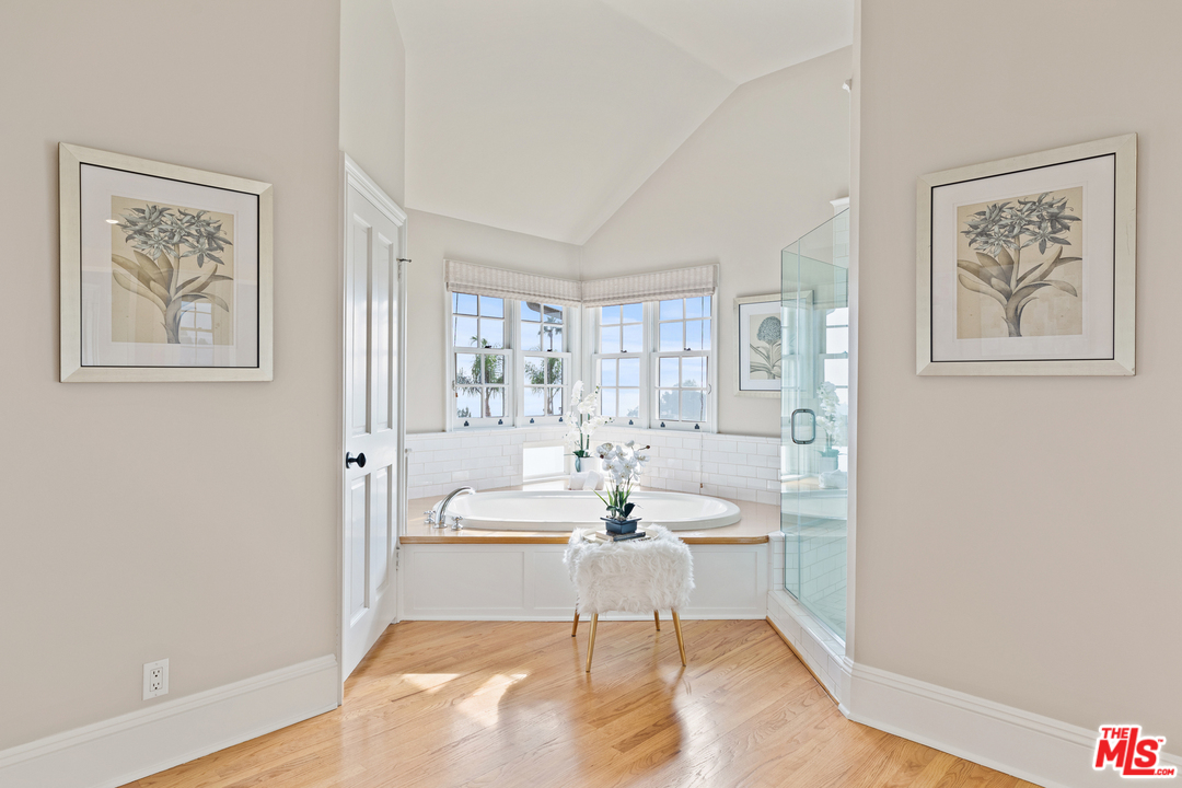 1110 Stradella Road Los Angeles, CA 90077 - Photo 16 of 28 a living room with furniture and a painting on the wall