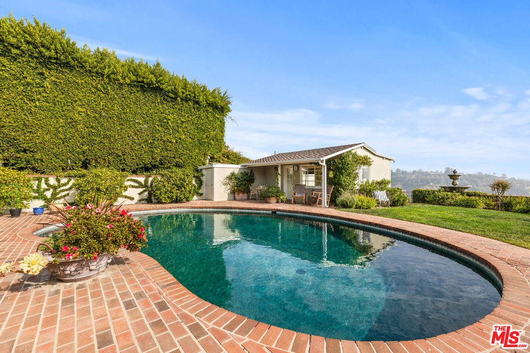1110 Stradella Road Los Angeles, CA 90077 - Photo 20 of 28 a view of swimming pool from a balcony