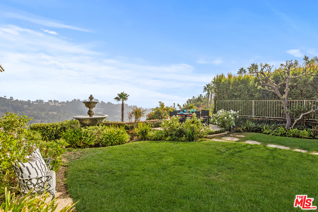 1110 Stradella Road Los Angeles, CA 90077 - Photo 23 of 28 a view of a garden