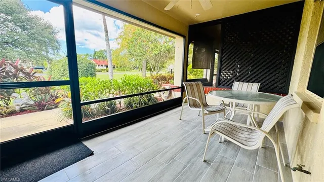 a view of two chairs in the balcony