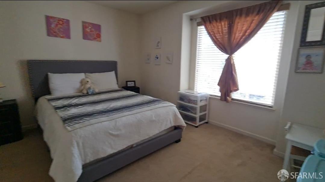 716 Seminole Court Discovery Bay, CA 94505 - Photo 10 of 21 a bedroom with a bed and a window