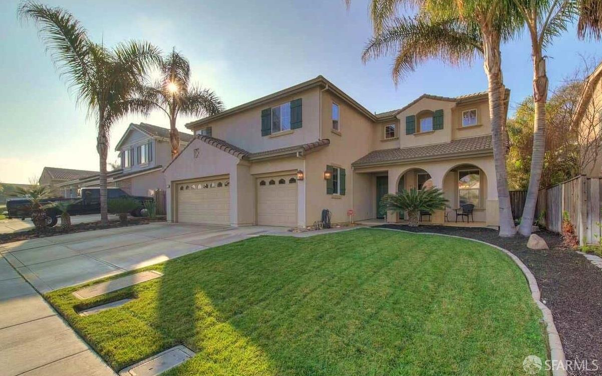 716 Seminole Court Discovery Bay, CA 94505 - Photo 16 of 21 a front view of a house with yard and tree s