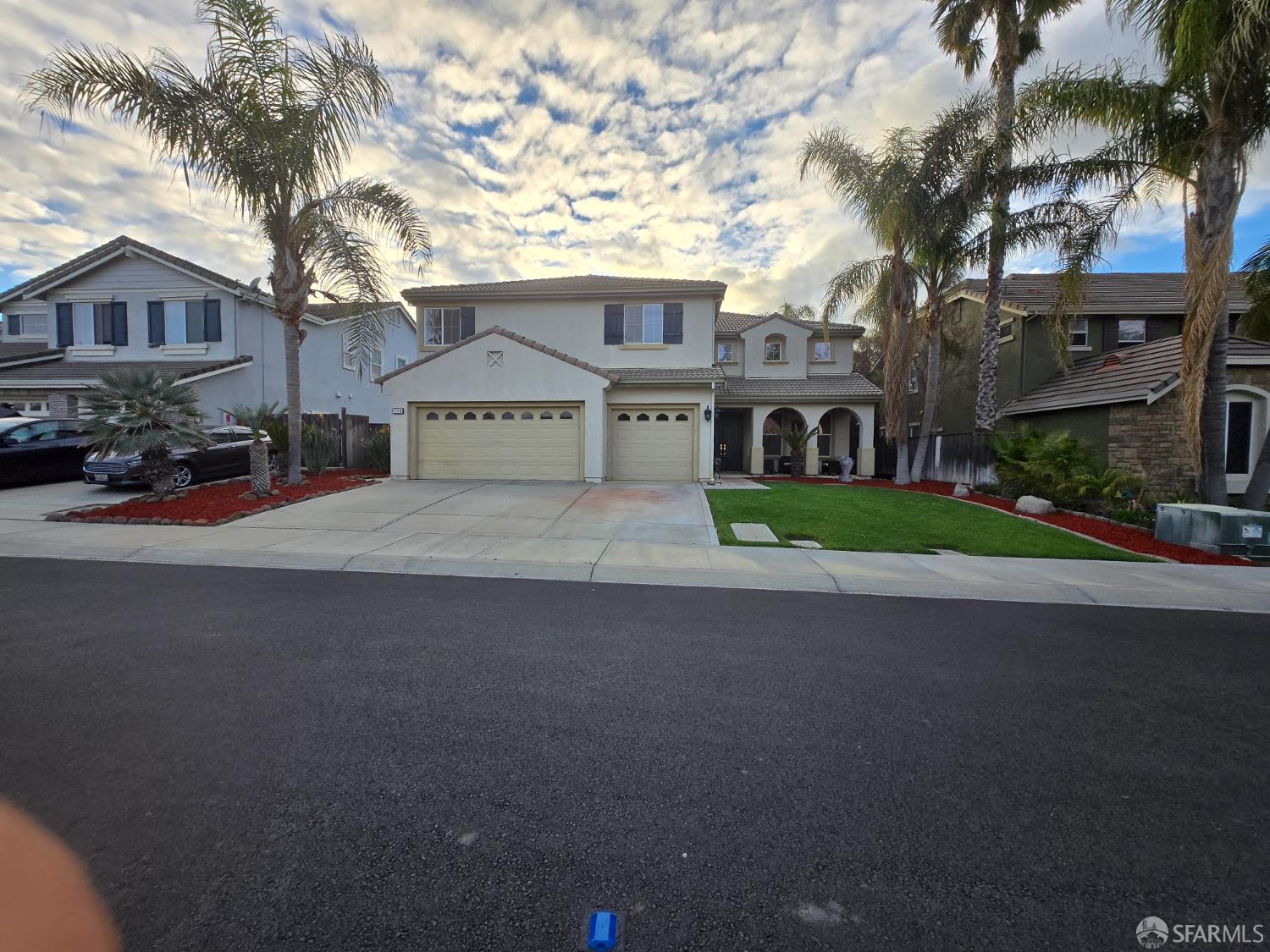 716 Seminole Court Discovery Bay, CA 94505 - Photo 17 of 21 a front view of a house with a garden and tree