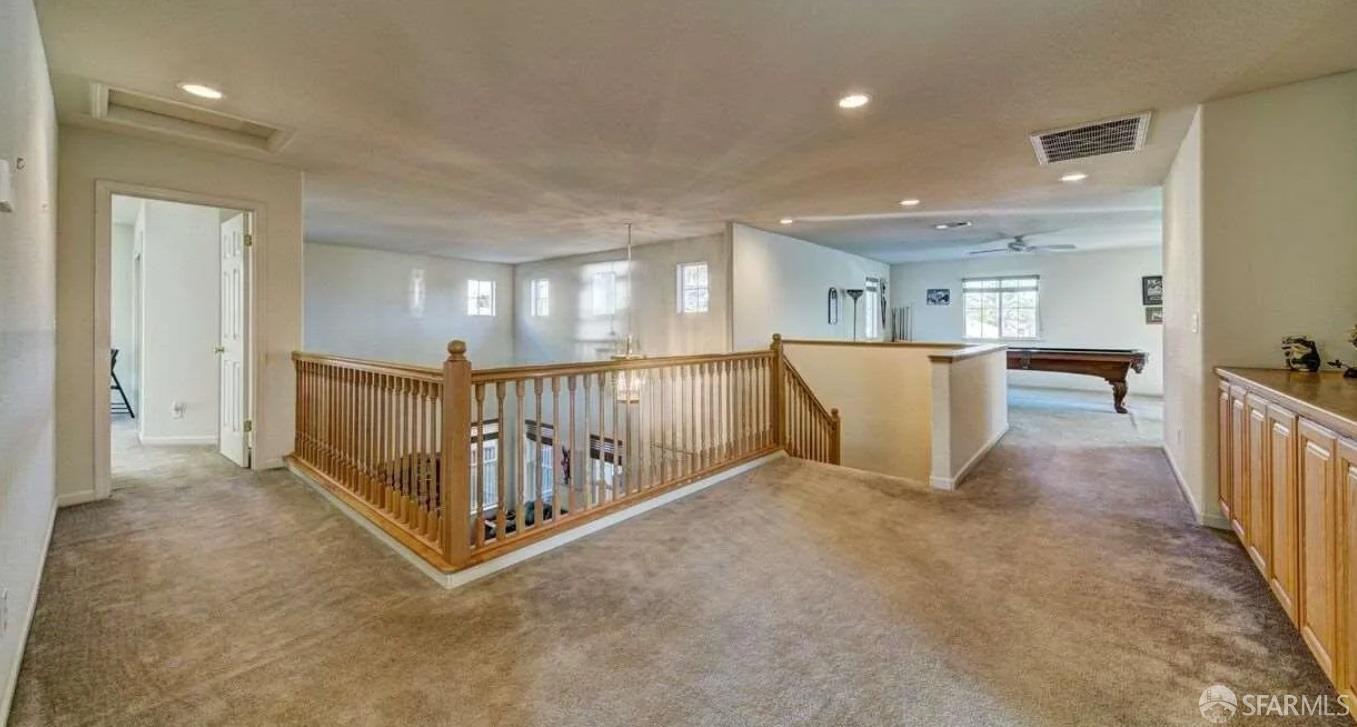 716 Seminole Court Discovery Bay, CA 94505 - Photo 6 of 21 a view of a hall with wooden floor