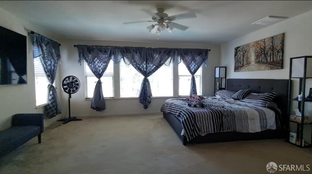 716 Seminole Court Discovery Bay, CA 94505 - Photo 8 of 21 a spacious bedroom with a balcony a bed and a window