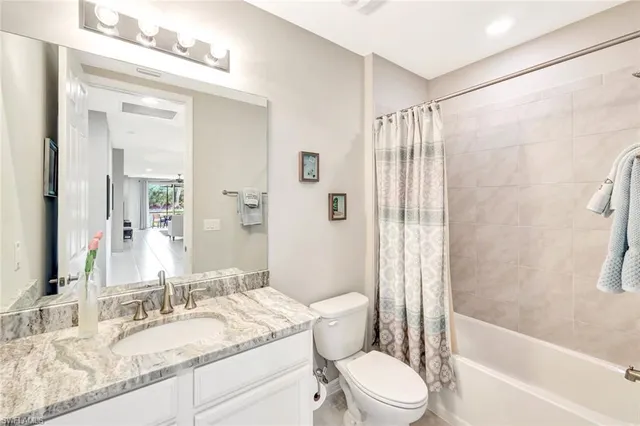 $469,900 | 14863 Edgewater Circle, Naples, FL 34114