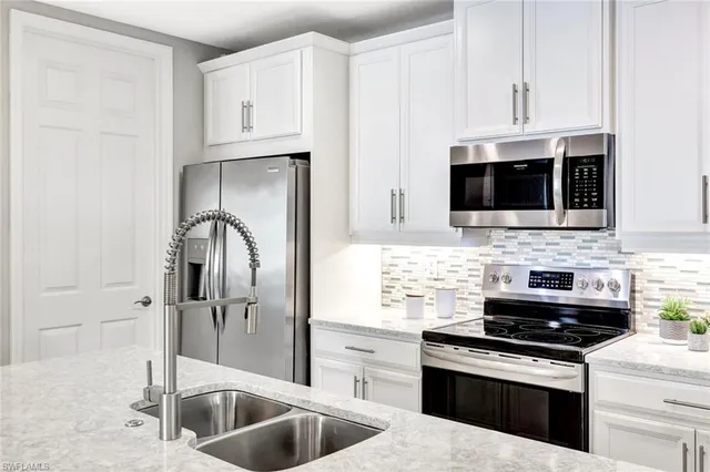 $469,900 | 14863 Edgewater Circle, Naples, FL 34114