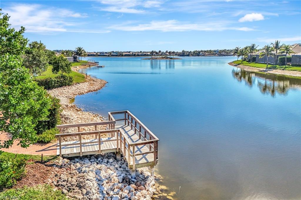 14863 Edgewater Circle Naples, FL 34114 - Photo 32 of 35 a view of a lake with a outdoor space