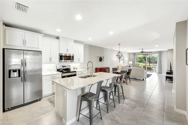 $469,900 | 14863 Edgewater Circle, Naples, FL 34114