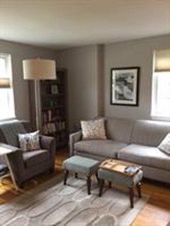 63 Linden Street, Unit 7 Wellesley, MA 02482 - Photo 5 of 11 a living room with furniture and a window