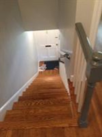 63 Linden Street, Unit 7 Wellesley, MA 02482 - Photo 7 of 11 a bedroom with a bed and a window