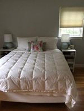 63 Linden Street, Unit 7 Wellesley, MA 02482 - Photo 8 of 11 a water heater sitting in a kitchen