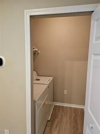 a bathroom with a shower and a sink